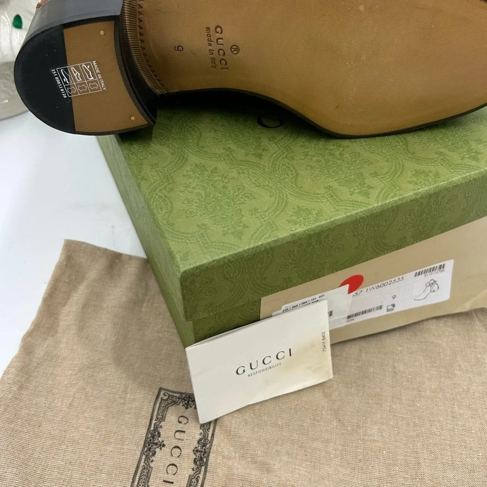 Men’s Gucci, leather ankle boots with buckle size 9 made in Italy